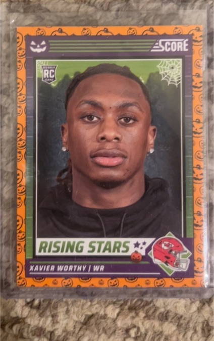 2024 Panini Score-A-Treat #50 Xavier Worthy Rising Stars Orange Pumpkins — front