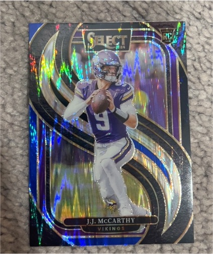 2024 Panini Select #134 J.J. McCarthy Premier Level Black & Green Shock Prizm Rookie — front