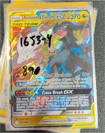 2019 Pokemon Cosmic Eclipse #157 Reshiram & Zekrom GX — front