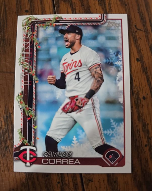 2025 Topps Holiday #204 Carlos Correa — front
