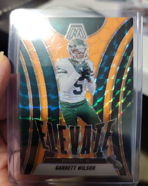 2025 Panini Mosaic #19 Garrett Wilson Elevate Orange Fluorescent — front