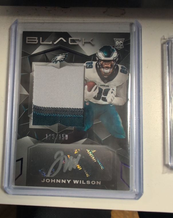 2024 Panini Black Rookie Patch Autograph # Johnny Wilson — front