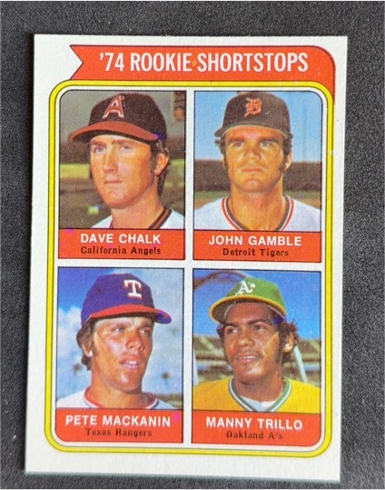 1974 Topps #597 Rookie Shortstops Dave Chalk John Gamble Pete Mackanin Manny Trillo — front
