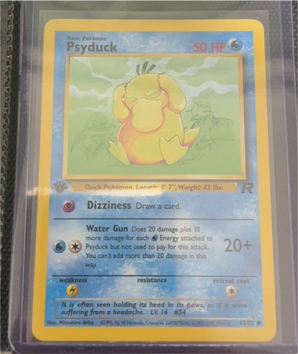 1999 Pokémon Team Rocket #65 Psyduck — front