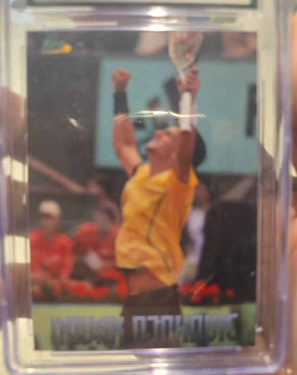2013 Topps Best of WWE Brock Lesnar Assaults Triple H — front