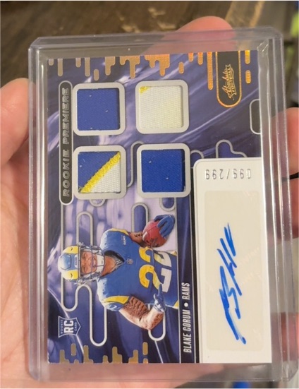 2024 Panini Absolute Rookie Premiere Materials Quad #/299 Blake Corum — front