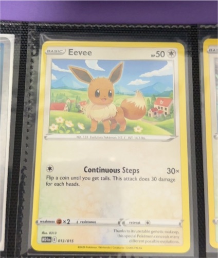 2025 McDonald's Dragon Discovery #013 Eevee — front