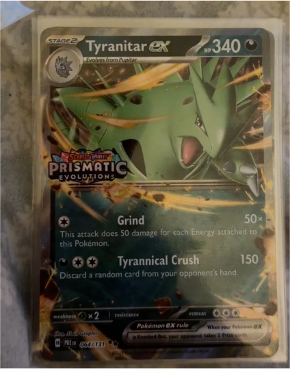 2025 Pokémon Prismatic Evolutions #064 Tyranitar ex — front