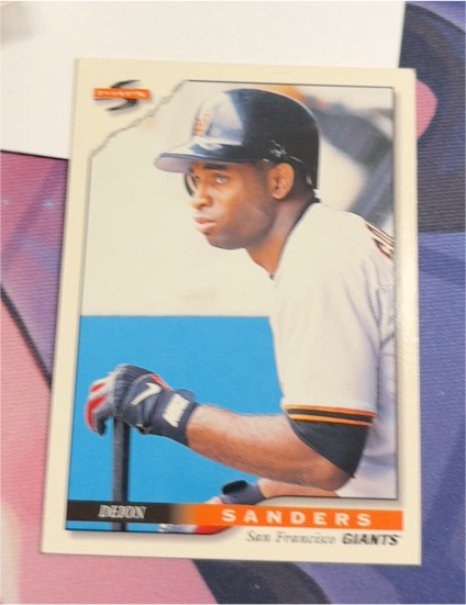 1996 Score #18 Deion Sanders — front