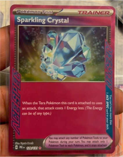 2024 Pokémon Prismatic Evolutions #129 Sparkling Crystal — front