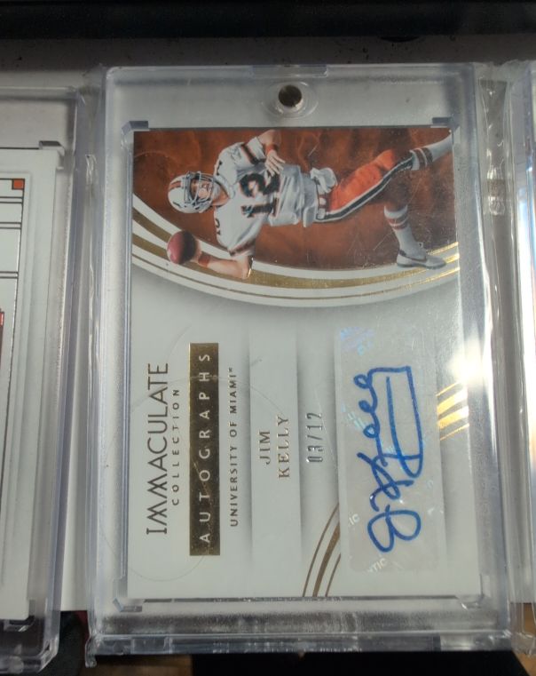 2016 Panini Immaculate Collection Autographs #11 Jim Kelly — front