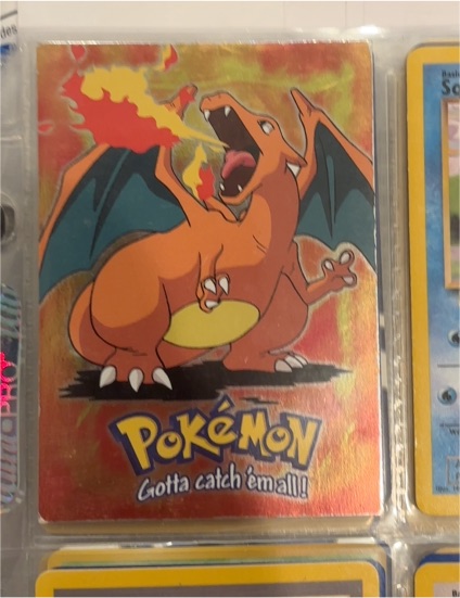 1999 Topps Pokemon Movie Edition #E6 Charizard — front