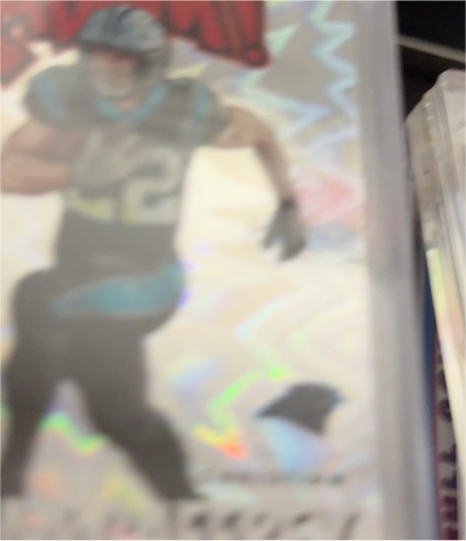 2023 Panini Illusions #12 Christian McCaffrey — front