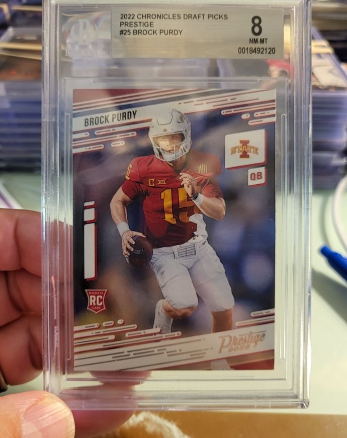 2022 Panini Chronicles Draft Picks Prestige #25 Brock Purdy — front