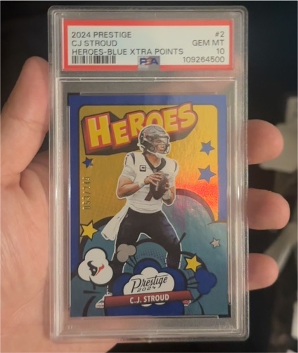 2024 Panini Prestige #2 C.J. Stroud Heroes-Blue Xtra Points — front