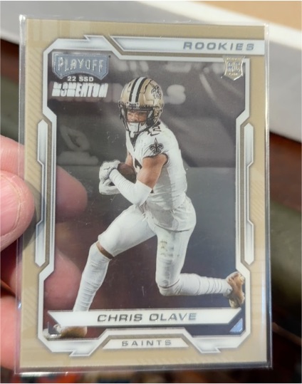 2022 Panini Chronicles Playoff Momentum #PMR-9 Chris Olave — front