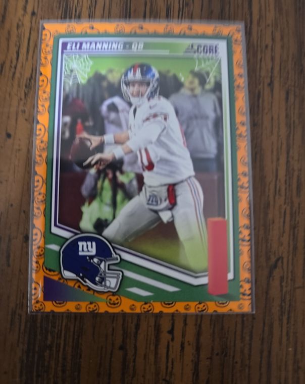 2025 Panini Score-A-Treat #78 Eli Manning — front