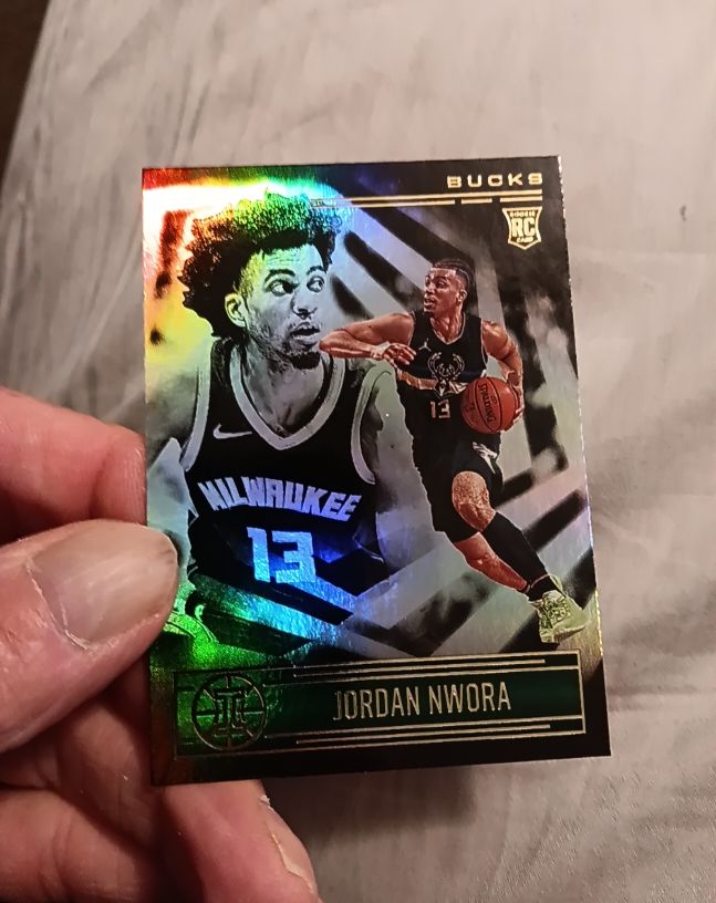 2020-21 Panini Illusions #174 Jordan Nwora — front