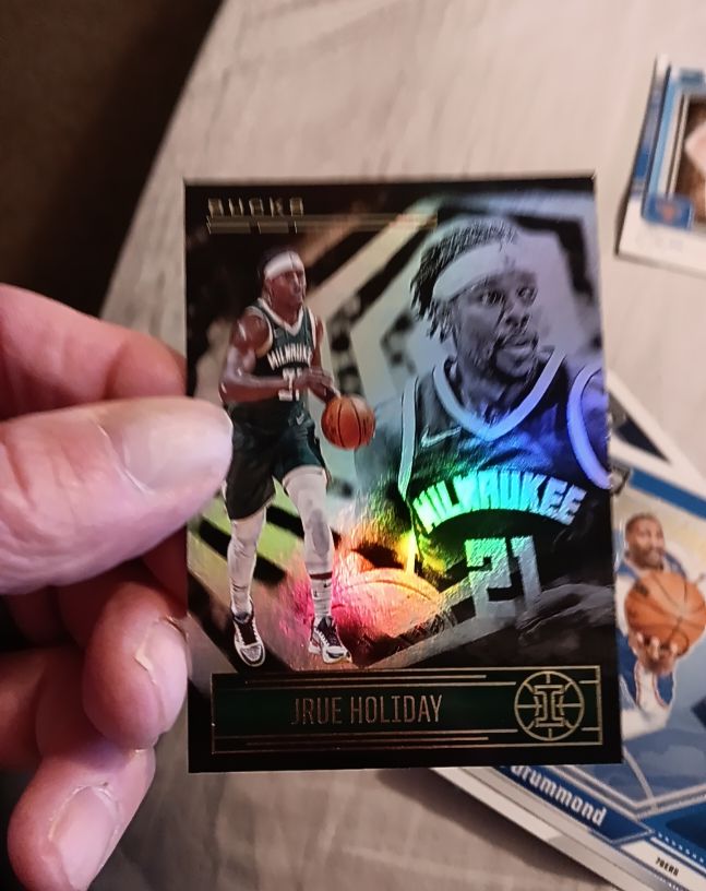 2020-21 Panini Illusions #21 Jrue Holiday — front