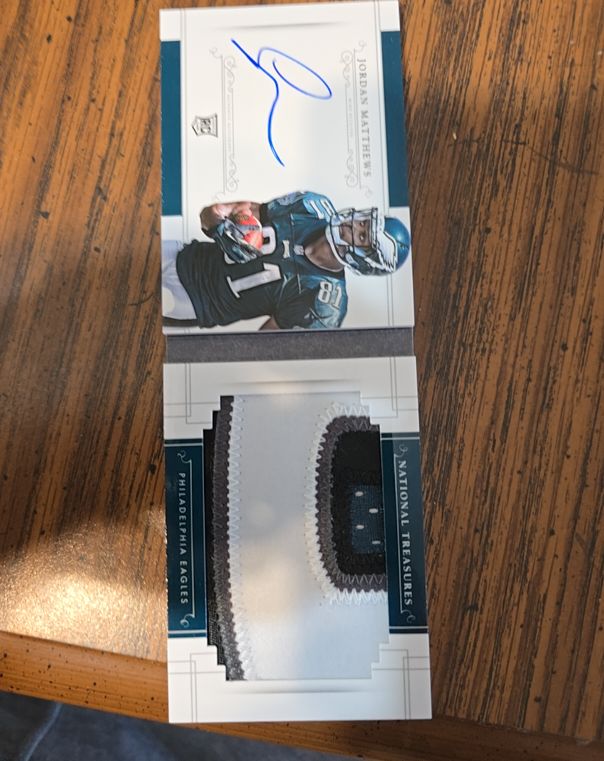 2014 Panini National Treasures #305 Jordan Matthews Jersey Auto/99 RC — front