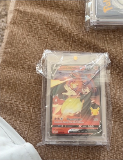 2021 Pokémon Celebration Promo #SWSH133 Lance's Charizard V — front