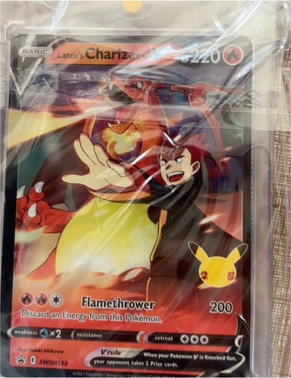 2021 Pokemon TCG Celebrations #SWSH133 Lance's Charizard V — front
