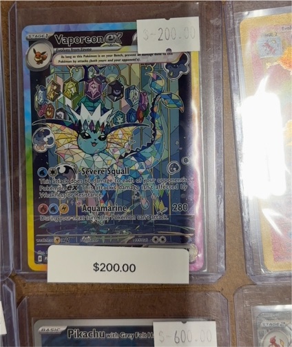2016 Pokémon Prismatic Evolutions #149 Vaporeon EX — front