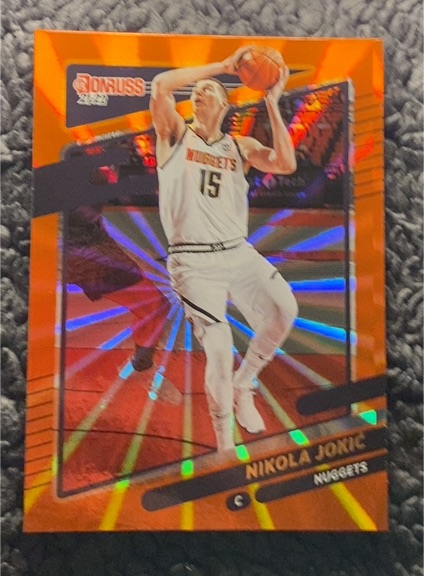 2021-22 Panini Donruss #28 Nikola Jokic Orange Laser — front