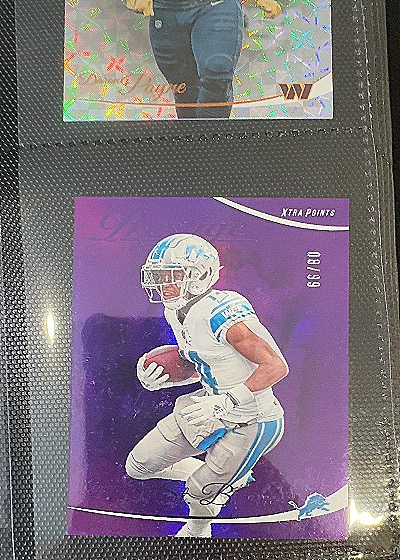 2023 Panini Prestige #110 Amon-Ra St. Brown Xtra Points Purple — front