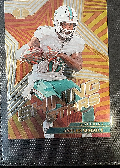 2023 Panini Illusions #10 Jaylen Waddle Shining Stars — front