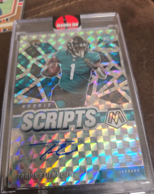 2021 Panini Mosaic Rookie Scripts #RS-1 Travis Etienne Jr — front