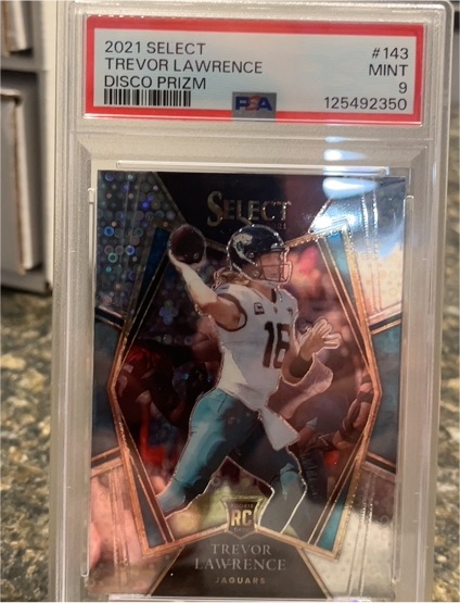 2021 Panini Select #143 Trevor Lawrence Disco Prizm — front