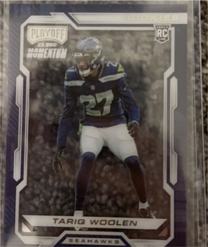 2022 Panini Chronicles Playoff Momentum #PMR-39 Tariq Woolen — front