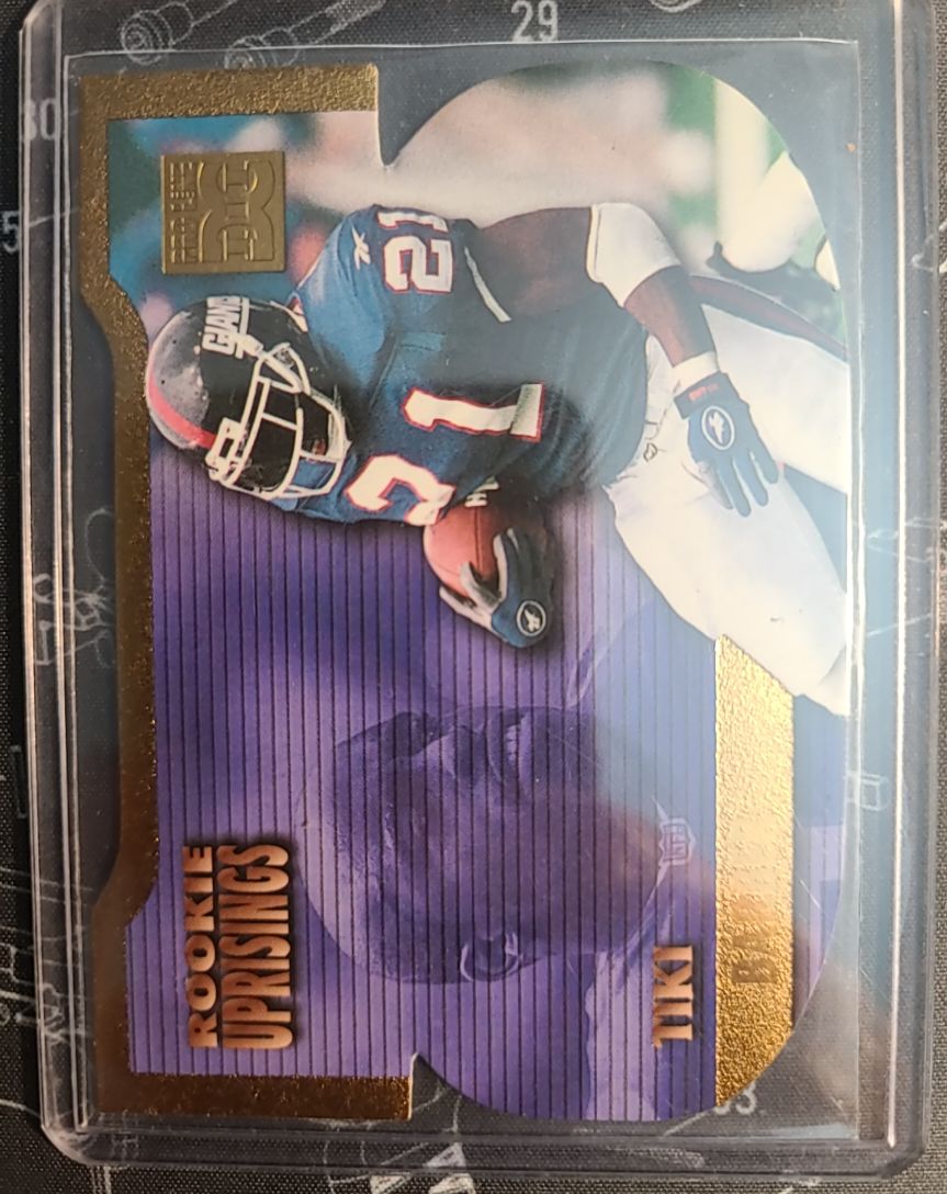 1997 Scoreboard Rookie Uprisings Die-Cut #99 Tiki Barber — front