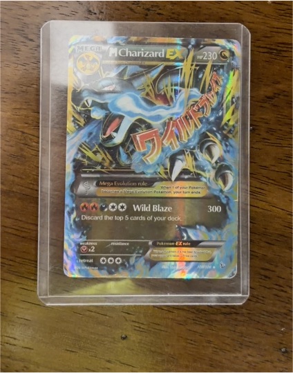 2014 Pokémon XY Flashfire #69 Mega Charizard EX — front