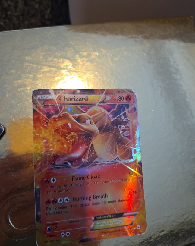 2016 Pokémon #11 Charizard EX — front