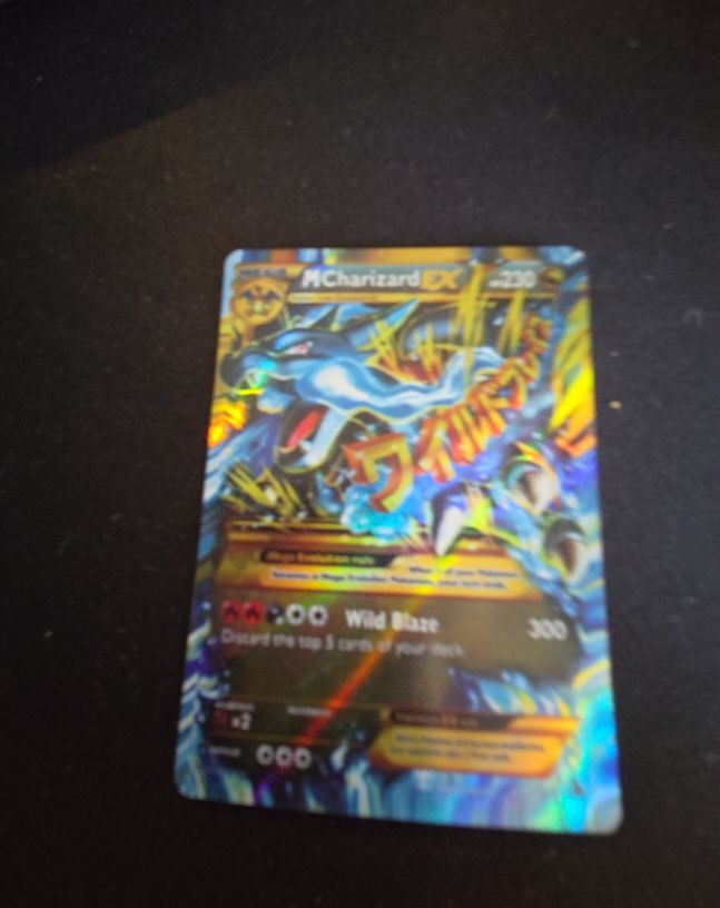 2014 Pokémon Flashfire #108 Mega Charizard EX — front