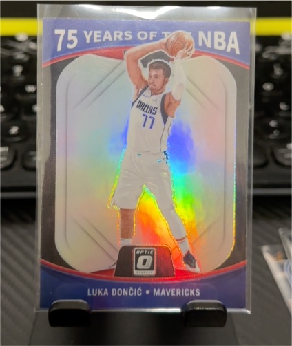 2021-22 Donruss Optic #26 Luka Dončić 75 Years of the NBA Silver Prizm — front