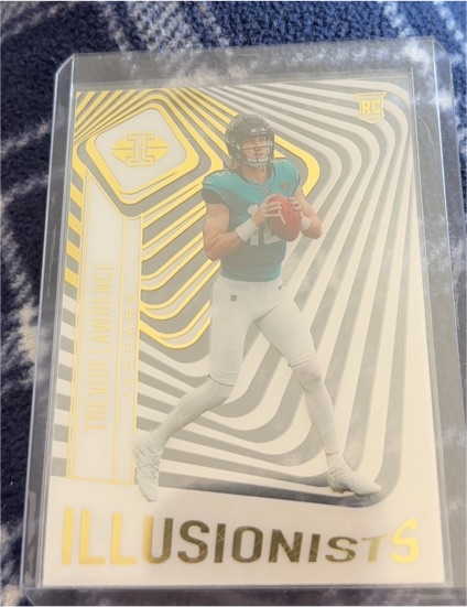2021 Panini Illusions #ILL-10 Trevor Lawrence Illusionists Rookie Card — front