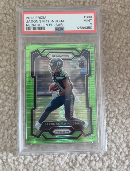 2023 Panini Prizm #390 Jaxon Smith-Njigba Neon Green Pulsar — front