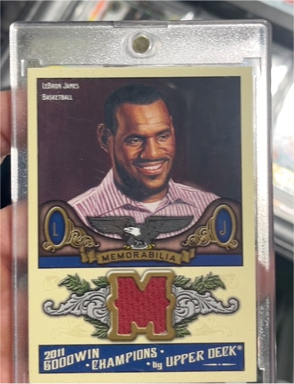 2011 Upper Deck Goodwin Champions #M-LJ LeBron James — front