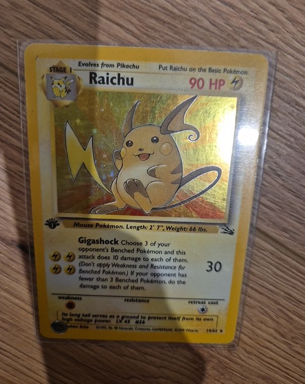 1999 Pokémon Fossil #29 Raichu — front