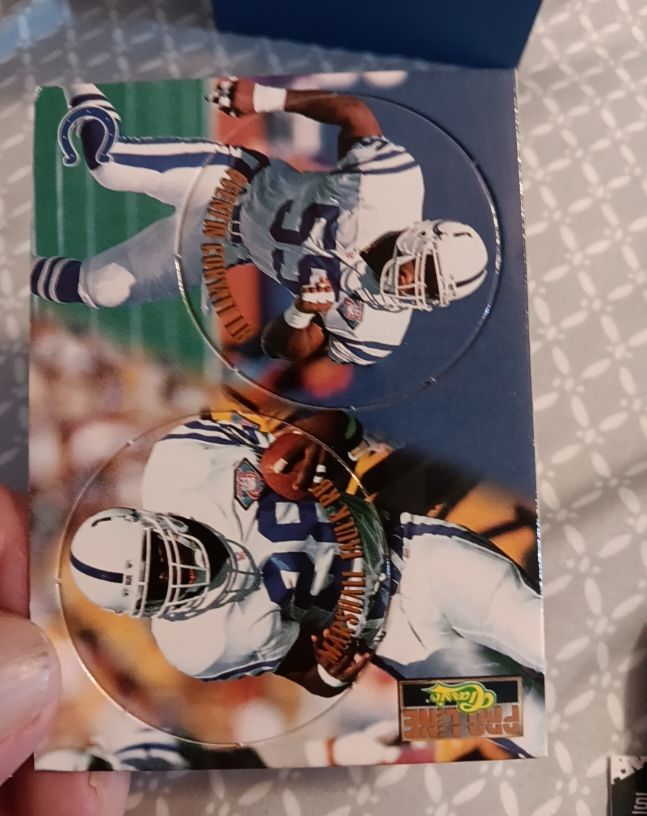 1995 Pro Line Pogs #C-13 Marshall Faulk / Quentin Coryatt Indianapolis Colts — front
