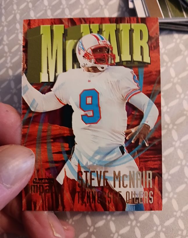 1997 SkyBox Impact #9 Steve McNair — front