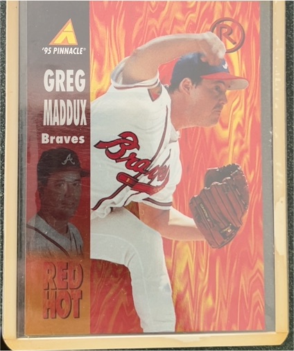 1995 Pinnacle Red Hot #RH12 Greg Maddux — front