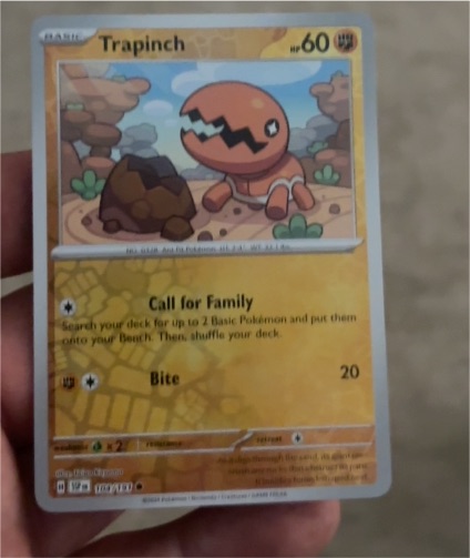 2024 Pokemon SV08: Surging Sparks #104 Trapinch — front