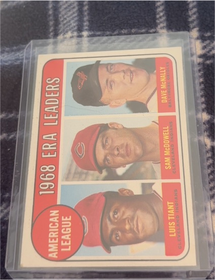 1969 Topps #7 AL ERA Leaders Luis Tiant, Sam McDowell, Dave McNally — front