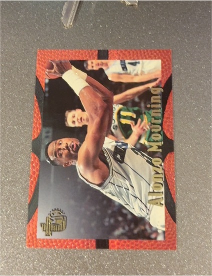 1994-95 Topps Embossed #12 Alonzo Mourning — front
