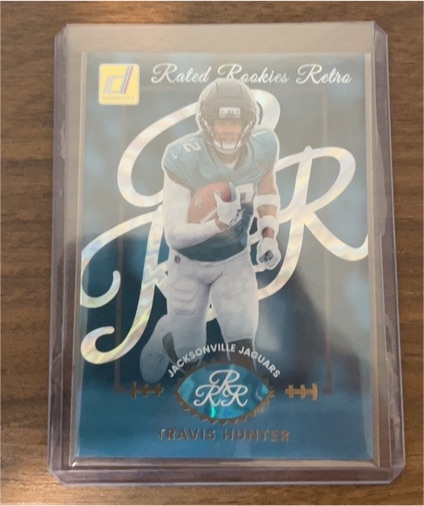 2025 Panini Donruss #4 Travis Hunter Rated Rookies Retro Jaguars — front
