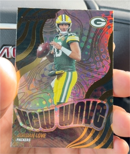 2025 Panini Revolution #22 Jordan Love New Wave — front